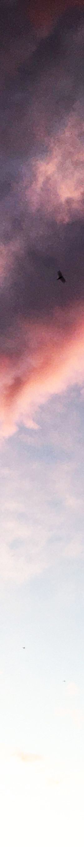Background image of a very pixelated sky
